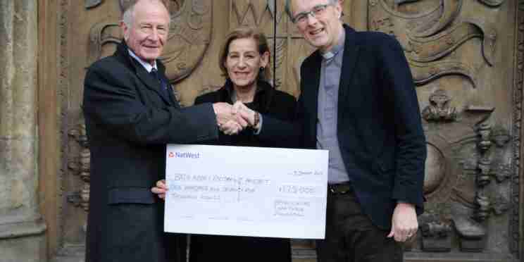 Cheque being presented by Andrew Brownsword