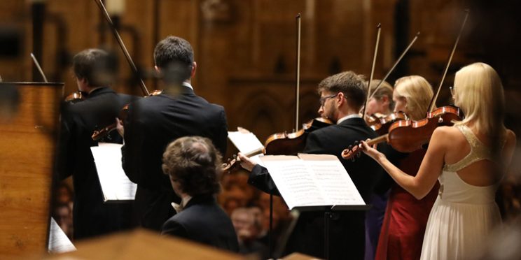 People playing violins